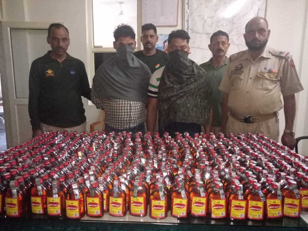 BOOTLEGGER NABBED WITH 590 QUARTER’S OF ILLICIT LIQUOR BY POONCH POLICE*.