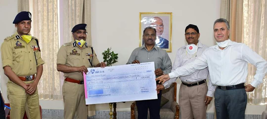 Covid_19 DGP J&K  a cheque of Rs.9,47,24,036 to Hon’ble Lt.Governor J&K UT