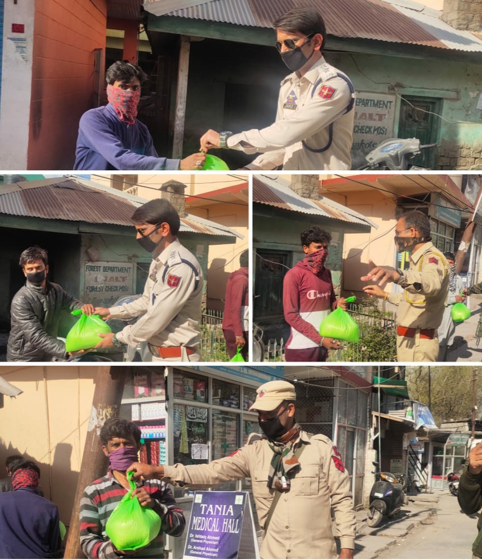 SDPO Surankote Javaid Tabassum (KPS)  SHO Surankote Anil Sharma Along With His Team   distributed food iteams  among poor, and needy.